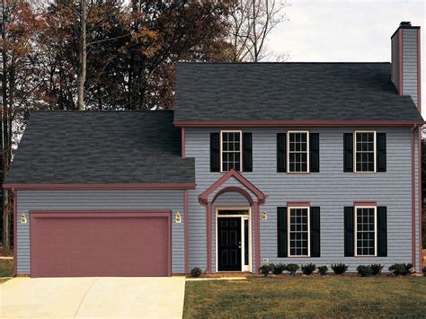 red metal roof on grey house|gray house with dark trim.